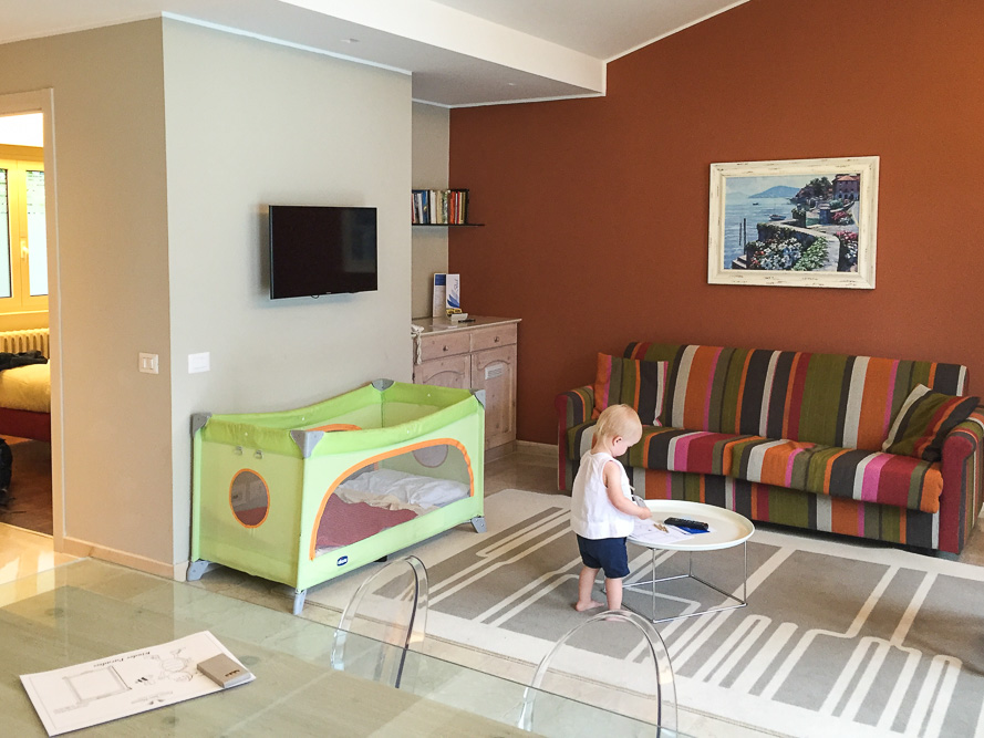 Our one bedroom suite with "expensive" travel cot.
