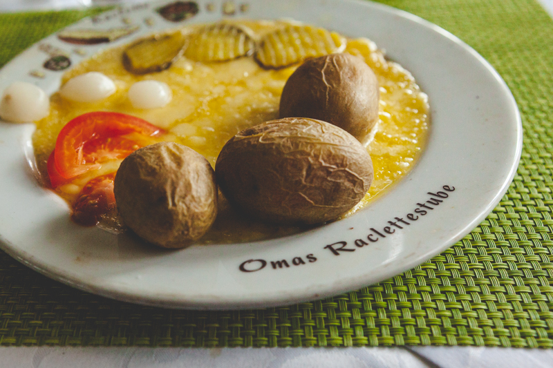 A plate of bubbling Raclette in Grächen