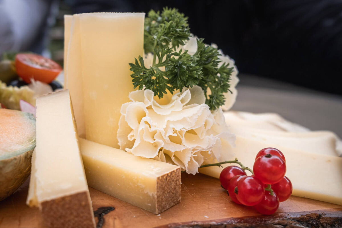 A Swiss cheese platter with some of the best Swiss cheeses, including Gruyère, and Tête de Moine