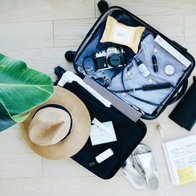 A suitcase open on bed